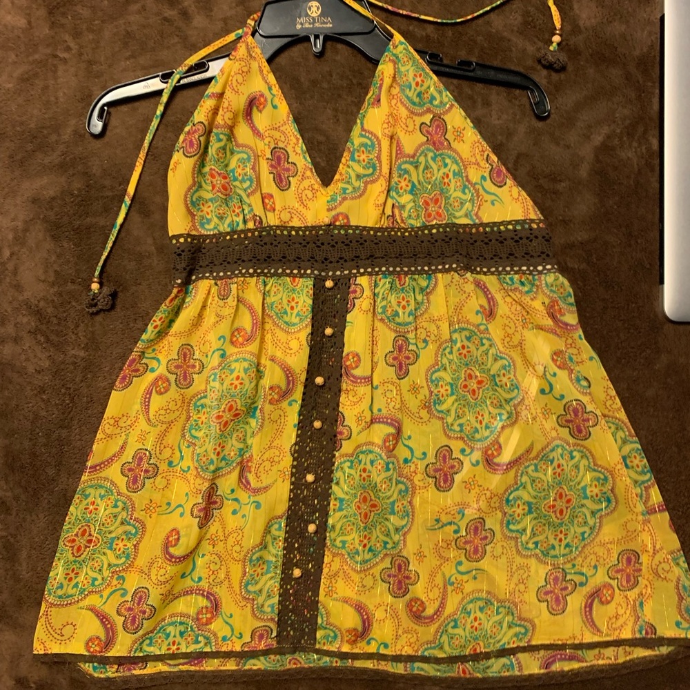Small to medium sleeveless blouse.
